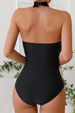 Monokini noir à col licou avec cache-maillot de plage fleuri