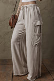 Pantalon cargo ample en lin beige style bohème avec cordon de serrage à la taille et bords bruts