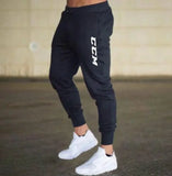 2024 Nouveau Pantalon Imprimé Automne CCM Hommes/Femmes Pantalons De Course Joggers Pantalon De Survêtement Sport Pantalon Décontracté Fitness Gym Pantalon Respirant