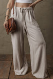 Pantalon cargo ample en lin beige style bohème avec cordon de serrage à la taille et bords bruts