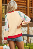 Haut beige à manches raglan et bordures colorblock avec imprimé patchwork et nœuds papillon